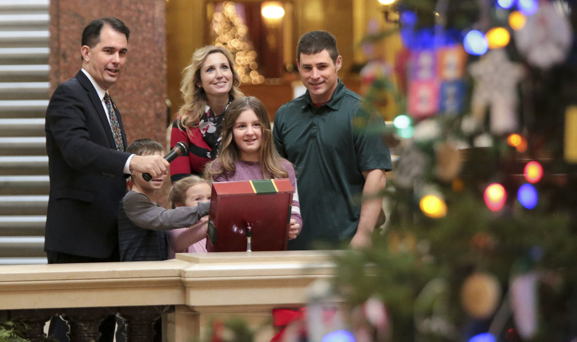 Light it up! Scott Walker ushers in the holiday season at the state Capitol